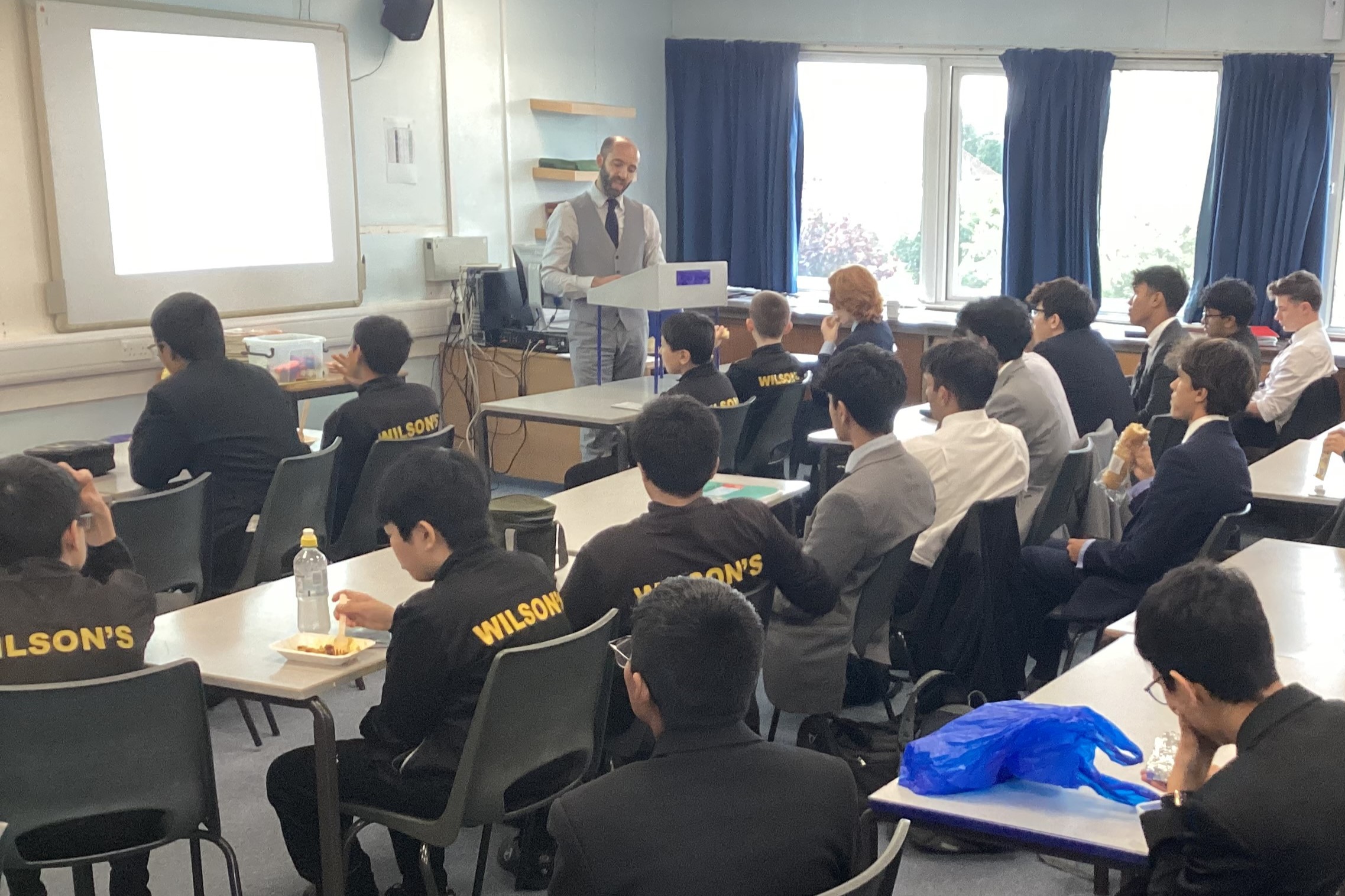 Mr Gore delivers lecture at History Club